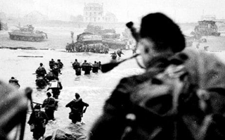 Illustration for article titled The Piper on Sword Beach